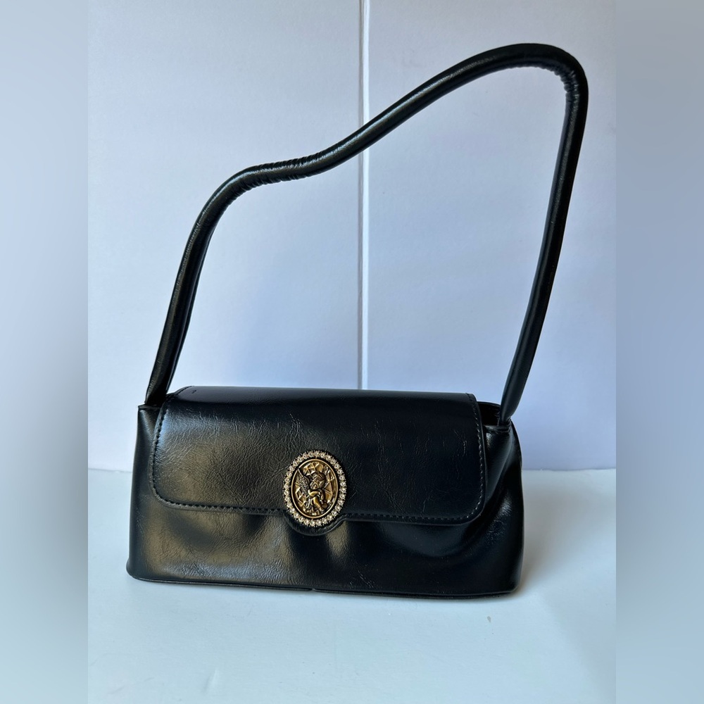 Vintage-Inspired Black Shoulder Bag with Gold Medallion